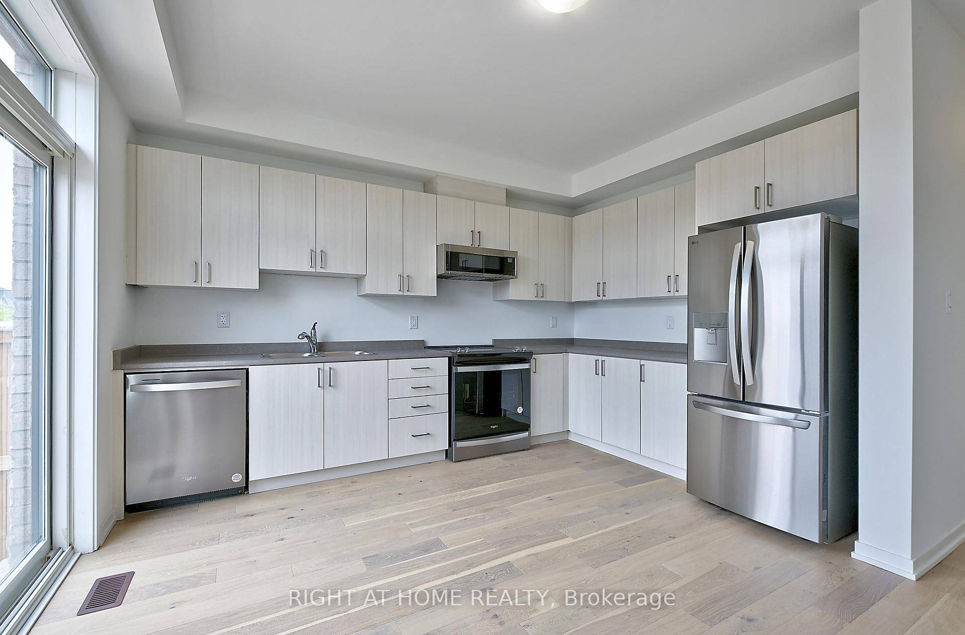 Beautiful freehold townhome offering a rare Live Work zoning allowing you to run your business from the main floor while enjoying the comfort of home upstairs.