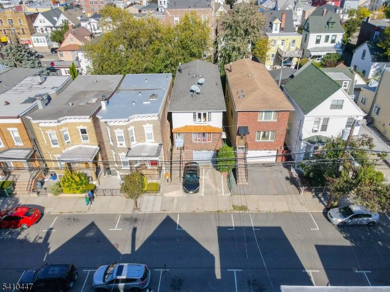 Welcome to this well maintained two family home just one block from Blvd East, offering an incredible opportunity for both investors and owner occupants.