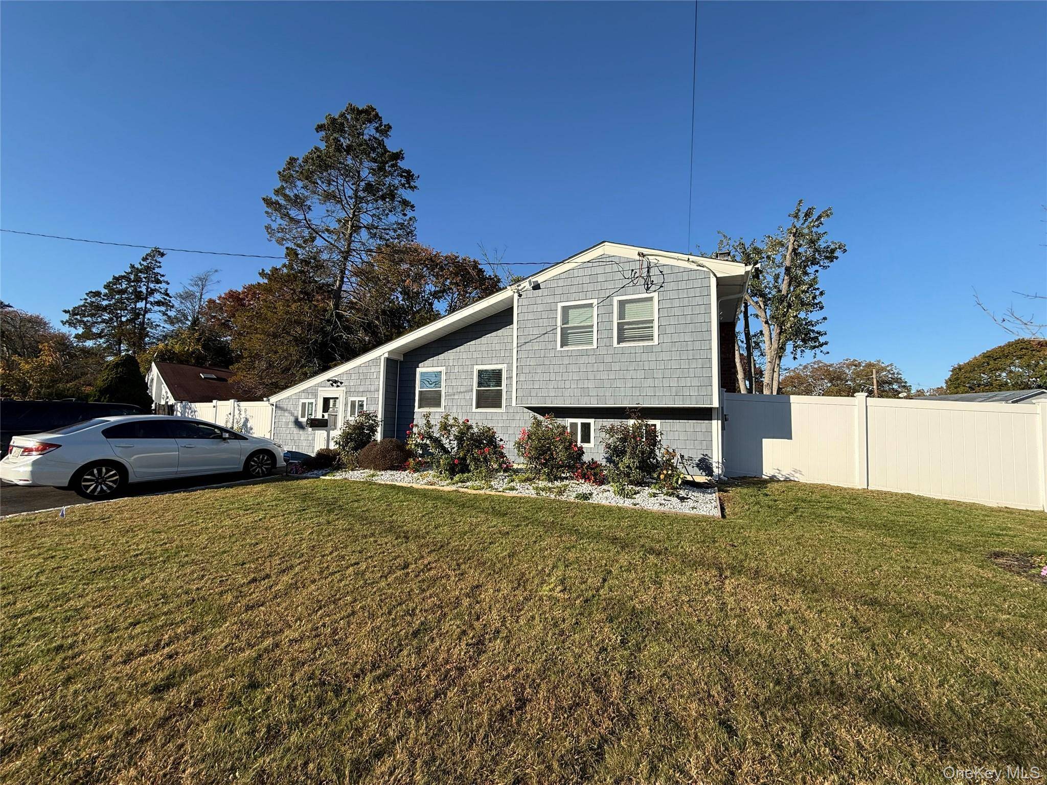 Welcome to 51 Bruce Lane, a beautifully updated split level home offering comfort, space, and style !