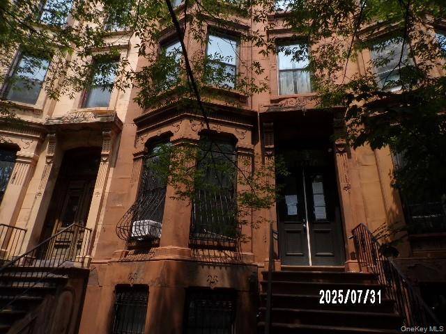 This three family home consists of unit one, a duplex on the ground floor and 1st floor.