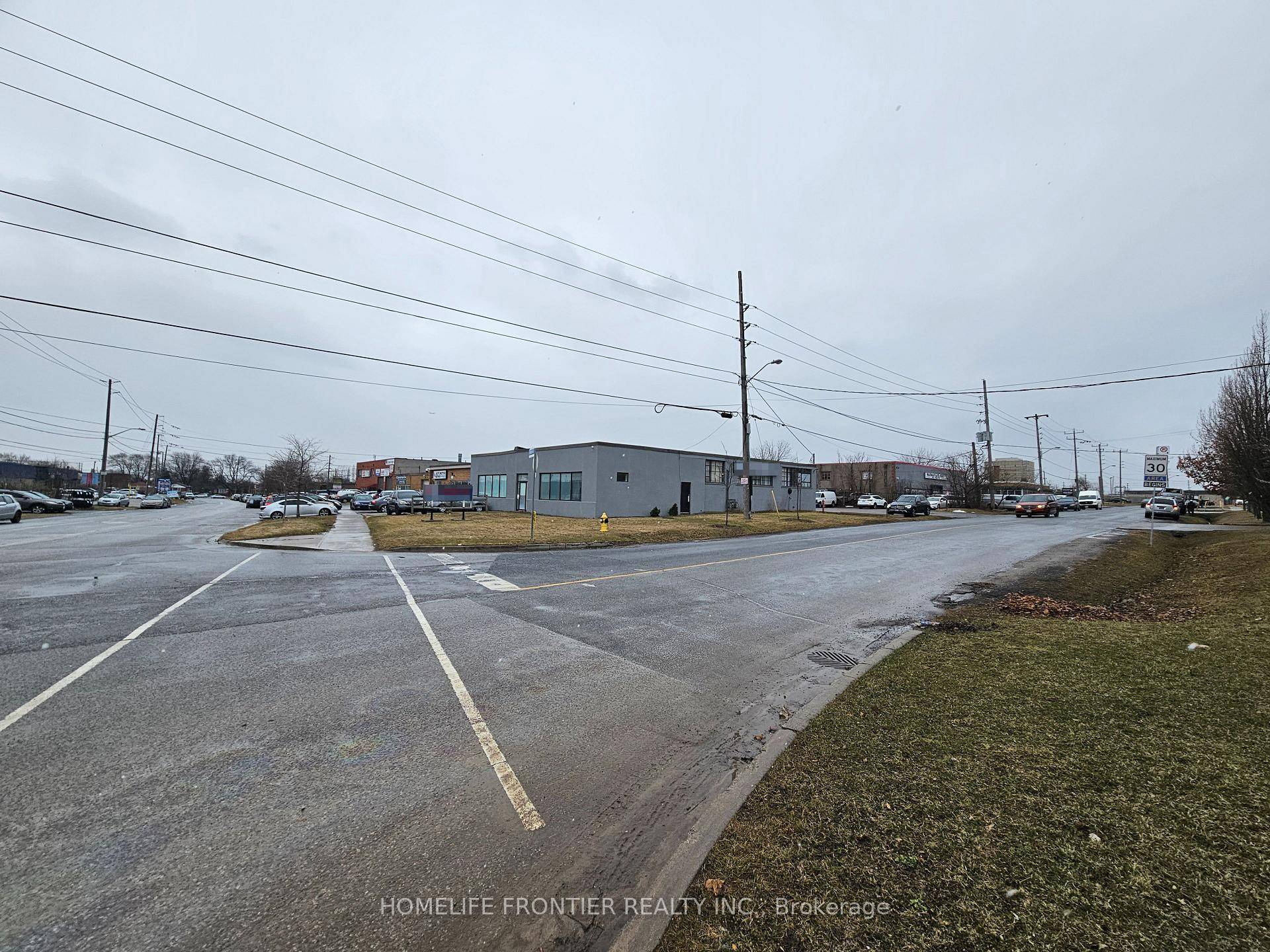 Excellent corner industrial property for sale at 13 Racine Rd, Etobicoke.