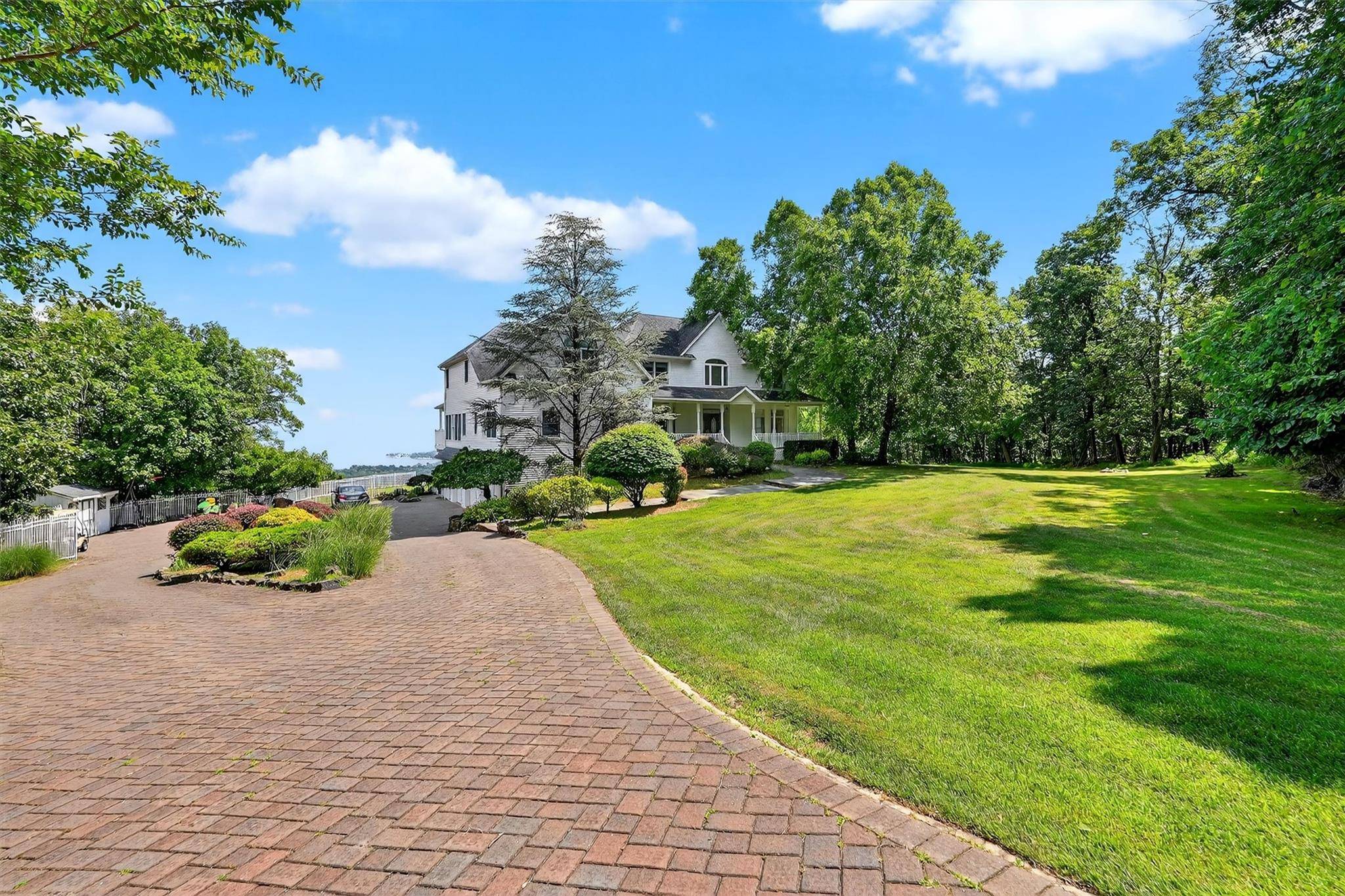A Gated Paradise with Panoramic Hudson River Valley Views !
