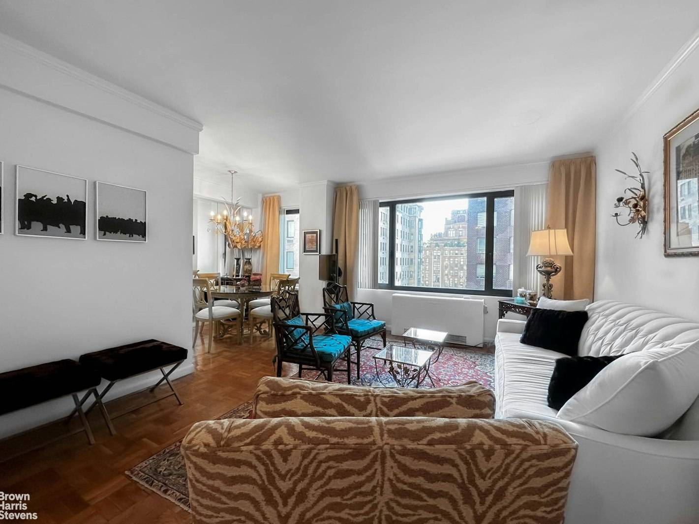 South facing studio with a dining alcove and dressing area.