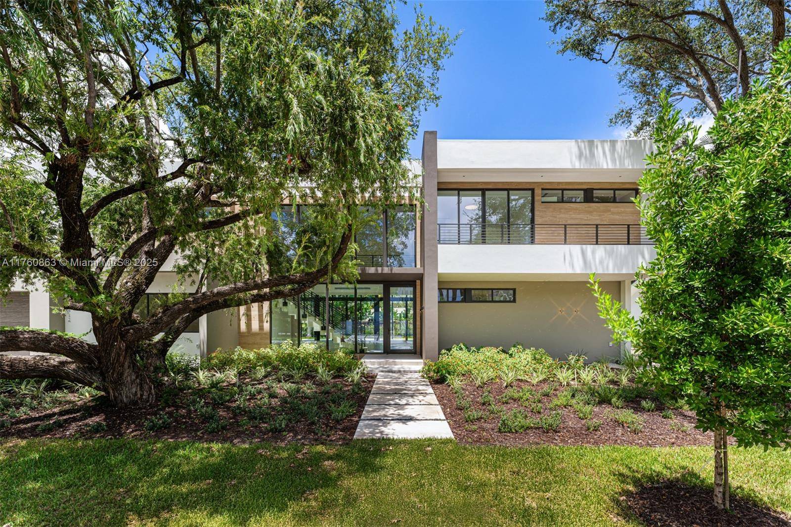 Step into this stunning residence on an oversized lot, where elegance meets modern design.