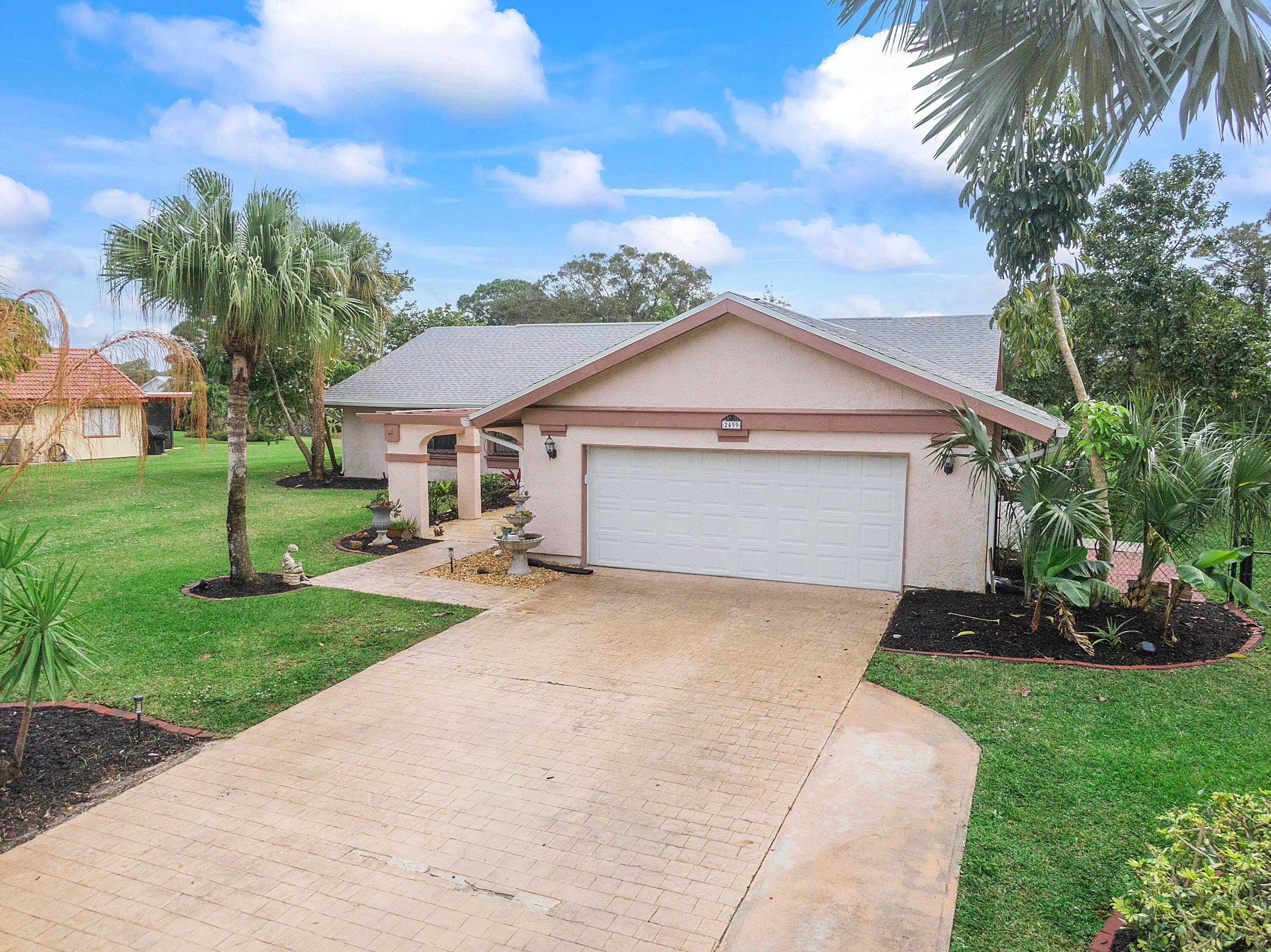 Discover historical Sandpiper area of Port Saint Lucie with no HOA fees and a room for a pool.