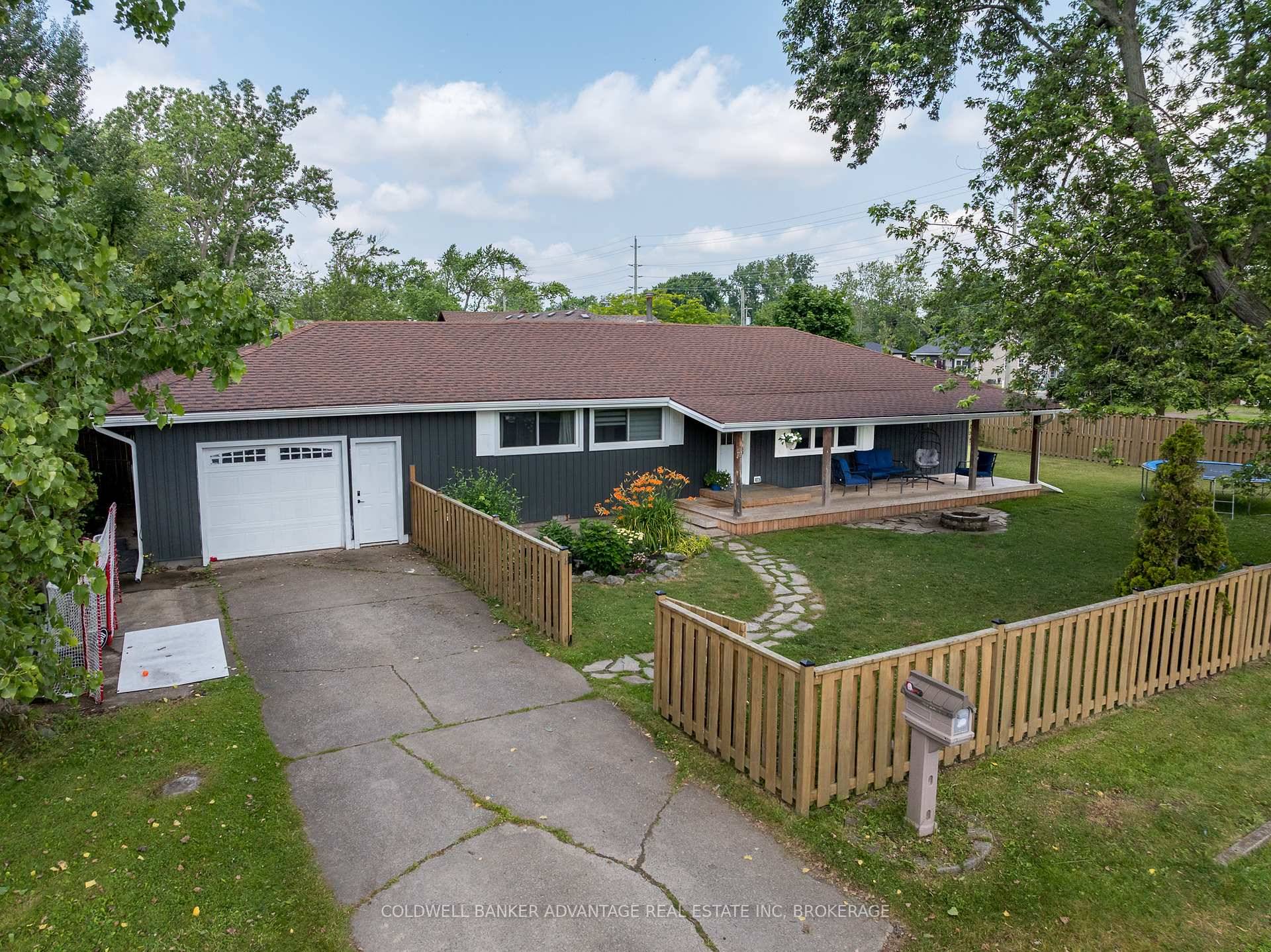 STEPS TO THE BEACH ! This is the bungalow you've been looking for.