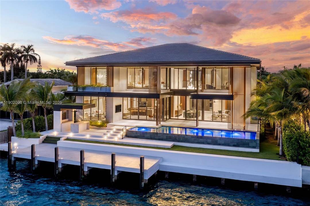 Experience uncompromising luxury in this newly completed tropical modern estate, set within the exclusive guard gated enclave of Sans Souci Estates.