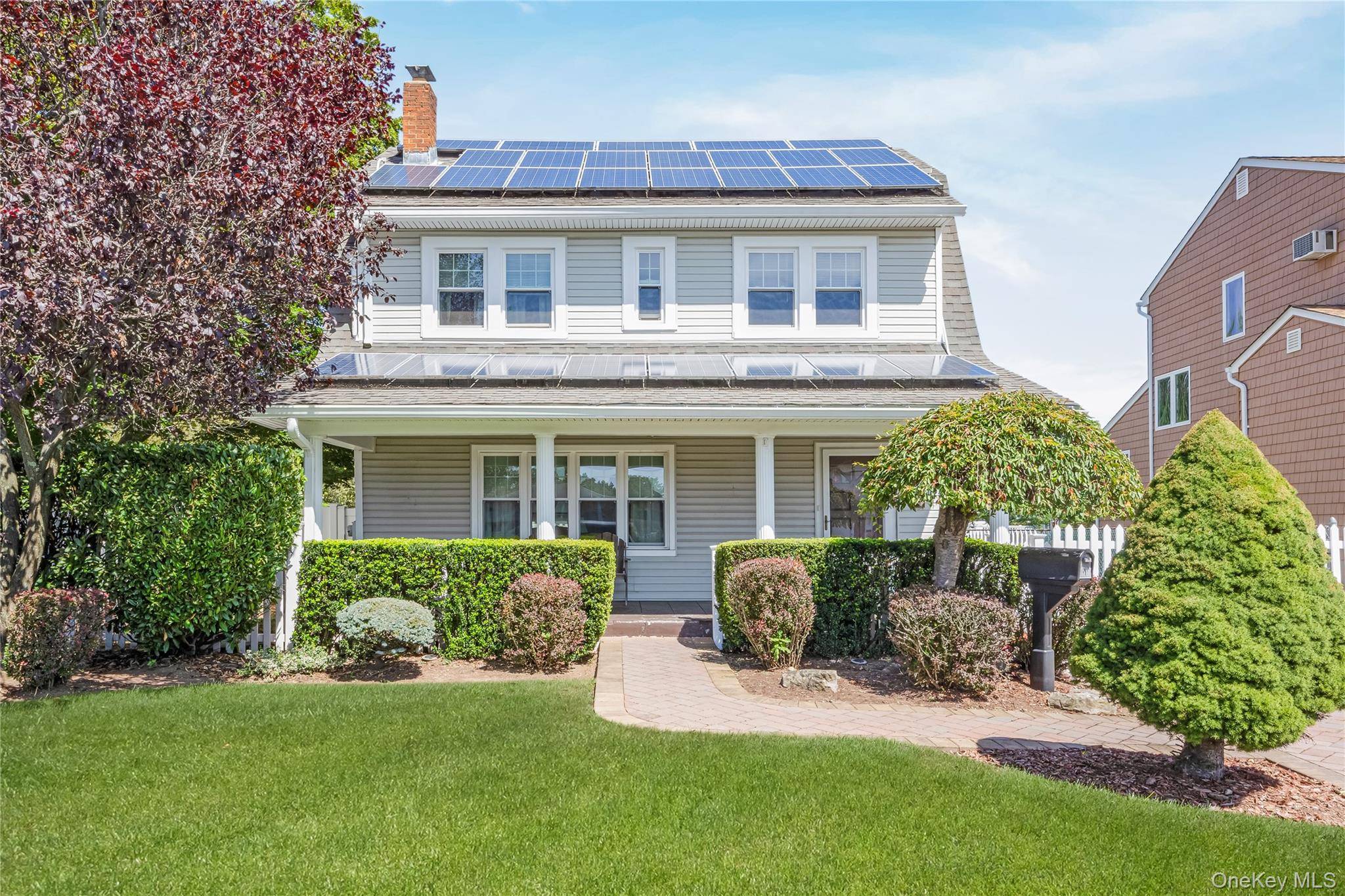 This charming Dutch Colonial offers the perfect blend of character and modern comfort with 3 spacious bedrooms and 2 full baths.