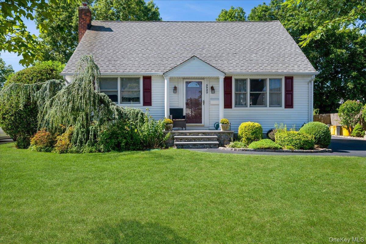 Charming and Expanded Cape with beautiful professional Landscaping !