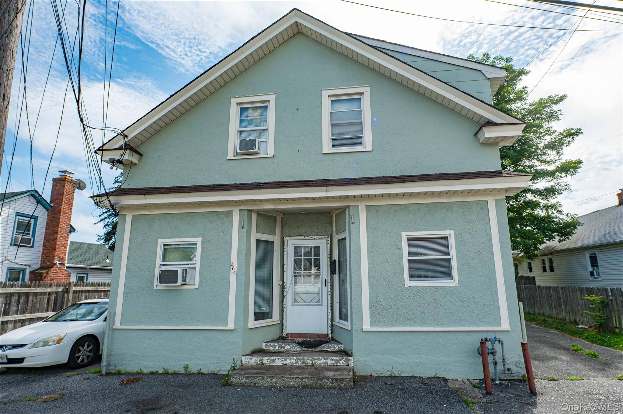 Opportunity knocks with this versatile investment property located in the Bay Shore School District !