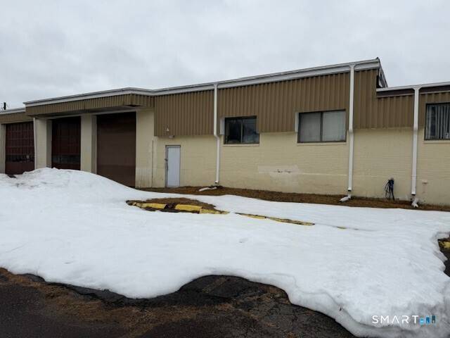 Position your business for success with this versatile commercial industrial property in South Windsor, conveniently located near major highways for easy access and transportation.