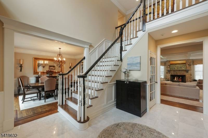 Set on 1. 7 flat, beautifully open acres, this exceptional 12 year old Colonial blends timeless elegance with modern luxury in the heart of Basking Ridge.