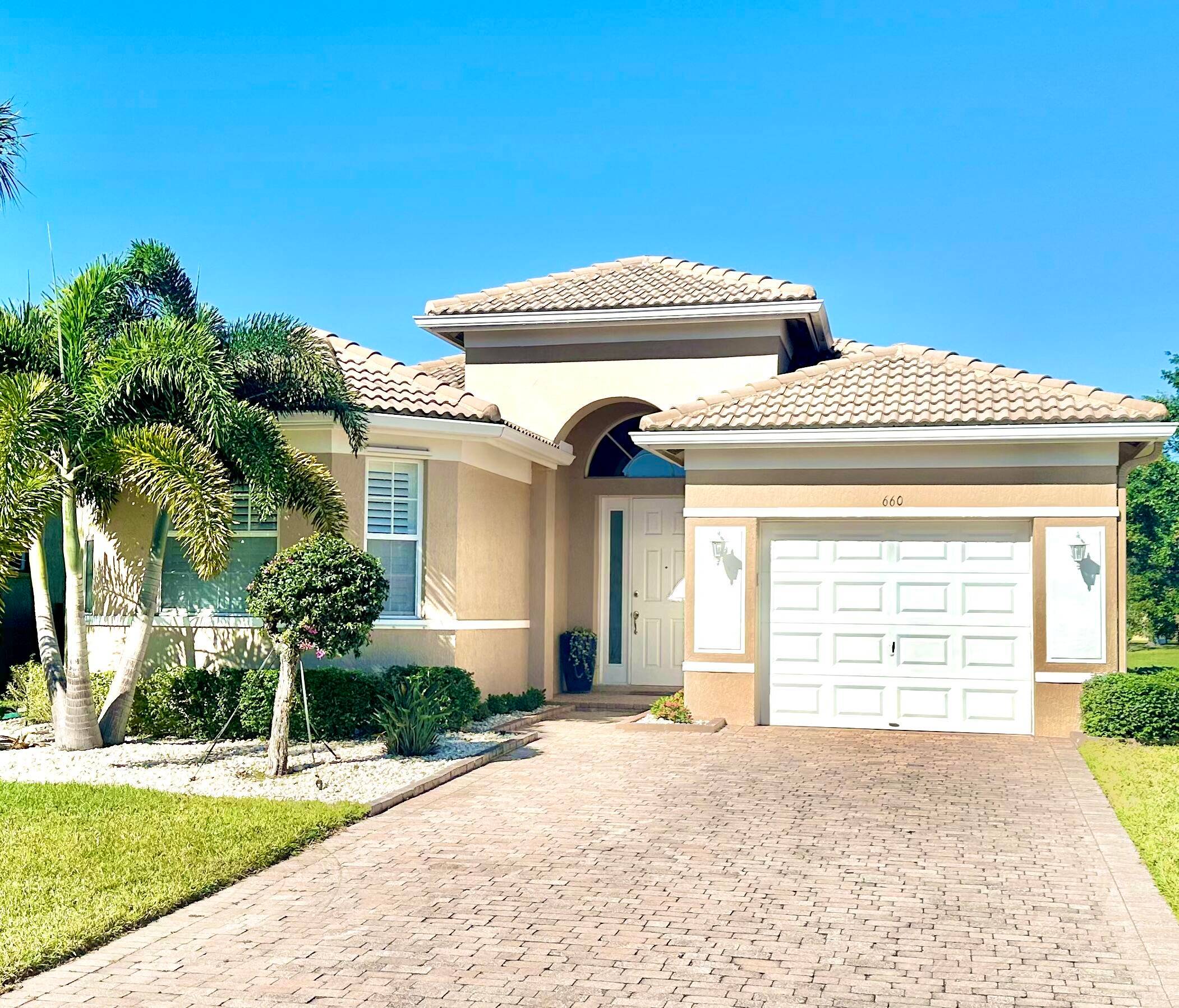 This meticulously maintained waterfront home overlooks the 13th Green at St.