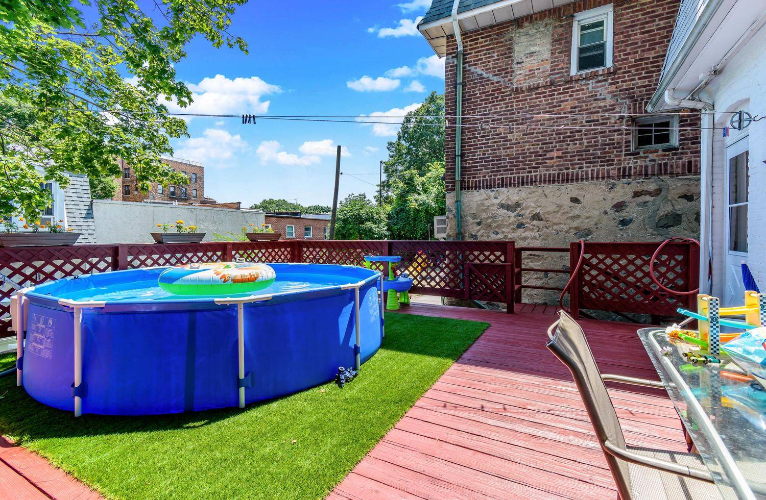 Single Family Residence, charming North Riverdale Dutch Colonial located on Spencer Ave.