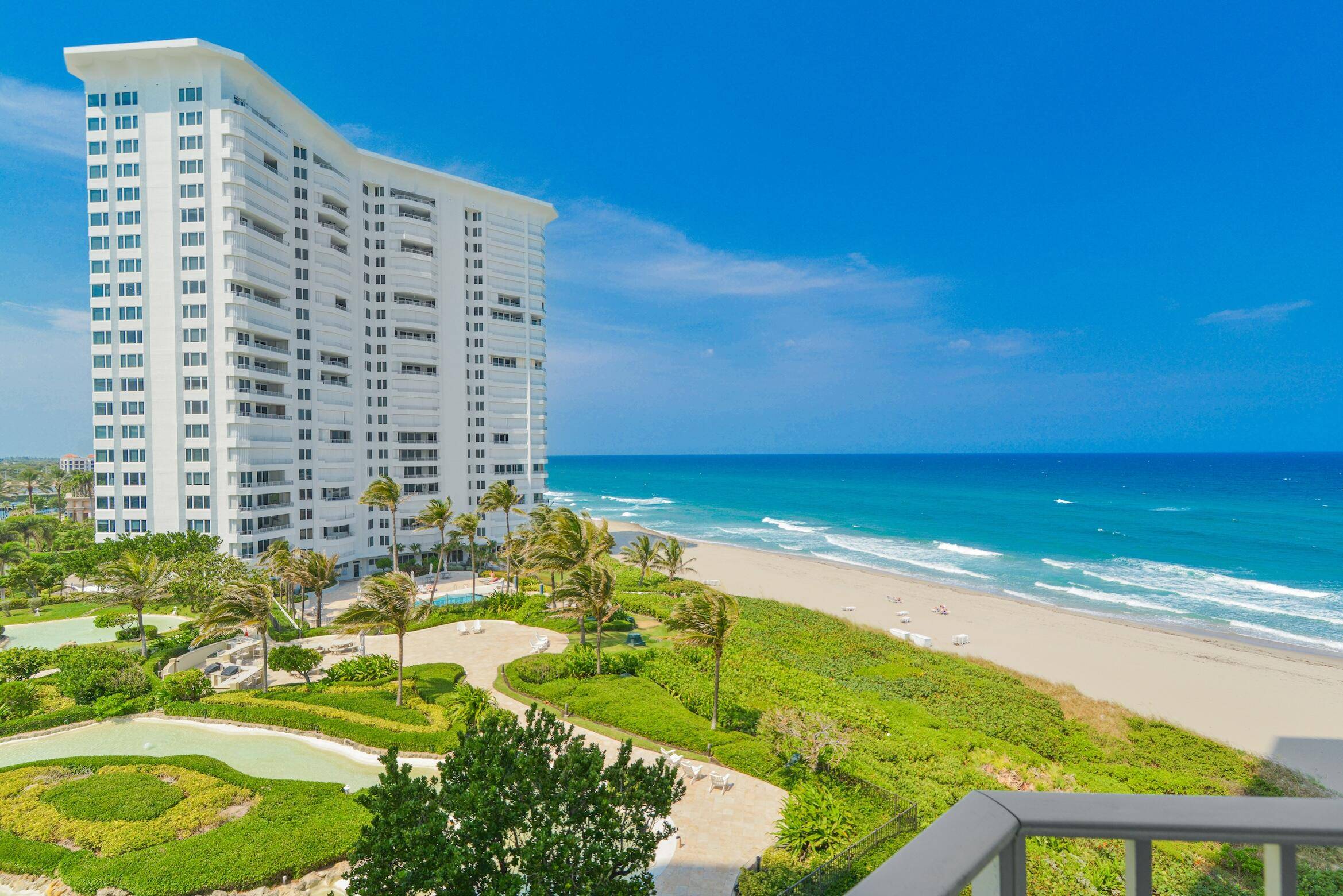 Oceanfront residence with breathtaking views of the ocean and manicured gardens.