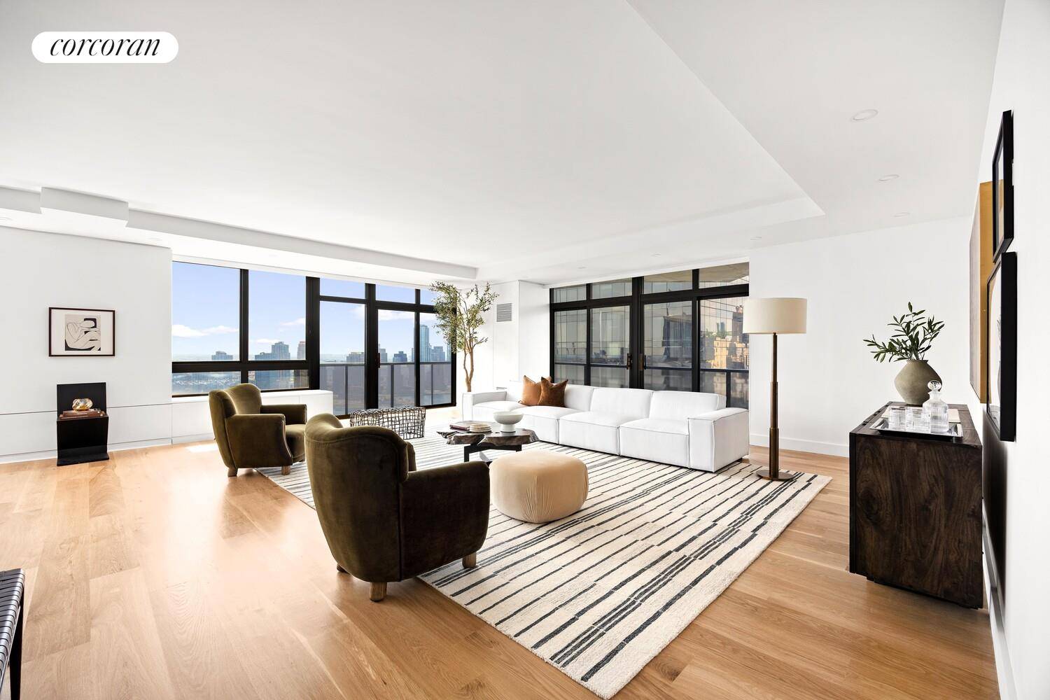 Brand new renovation just completed in apartment 33AB a rarely available, high floor, corner apartment boasting a 65' foot long expanse of spectacular East River views at 100 United Nations ...