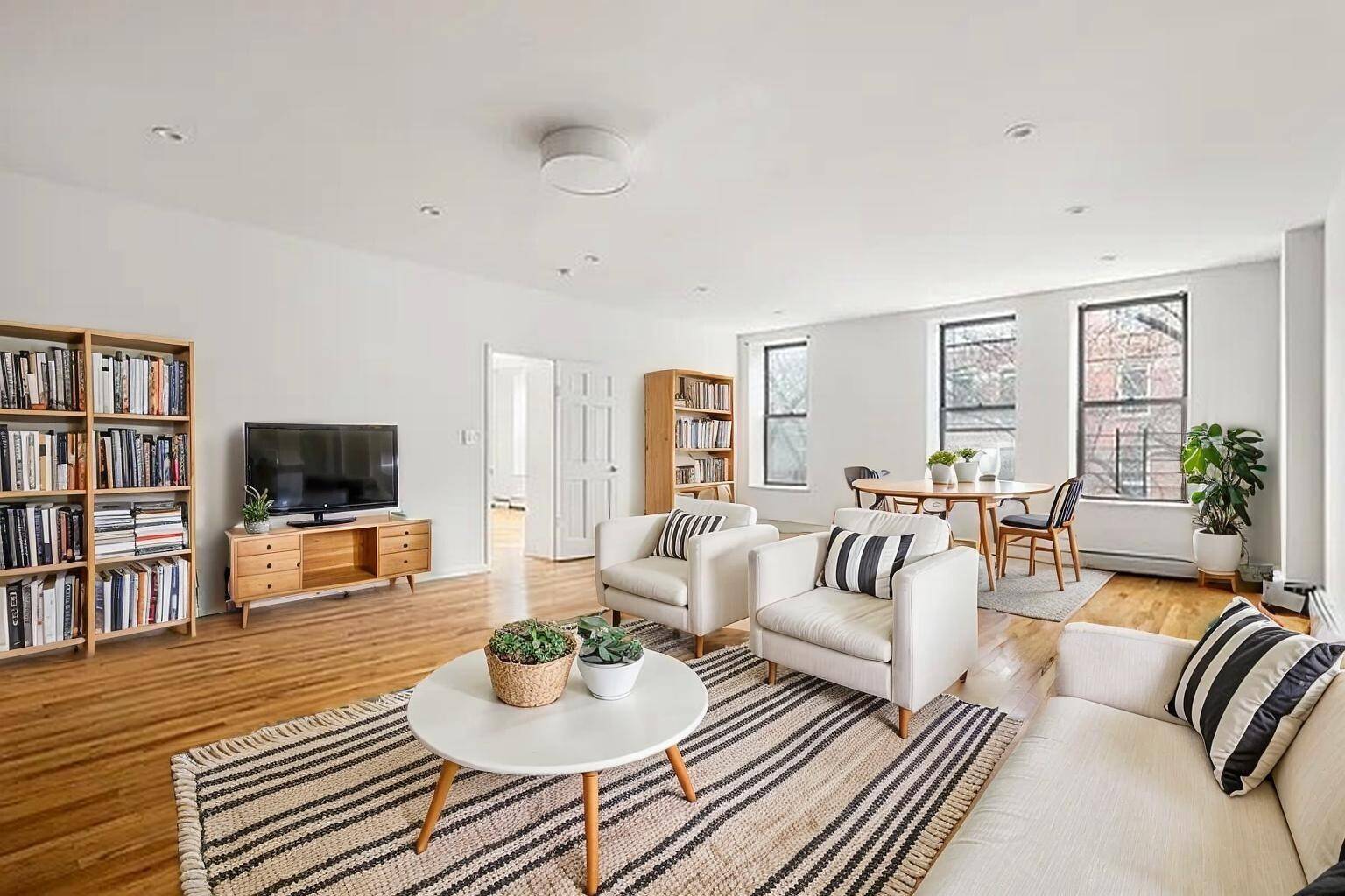 Bright and spacious corner 3 bedroom apartment with chef s kitchen in prime North Park Slope.