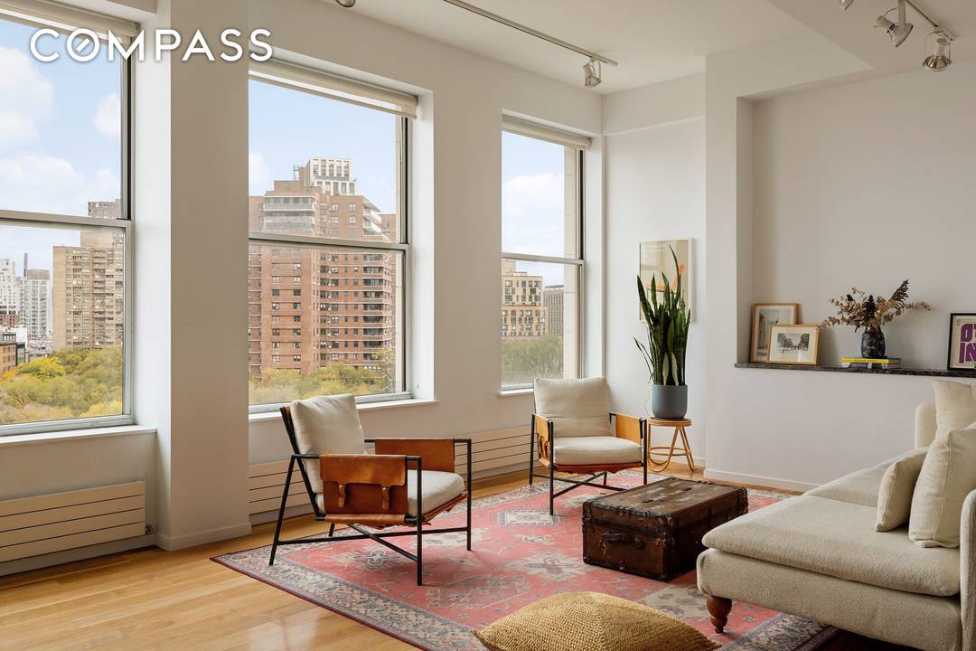 Highly coveted, rarely available, renovated, front facing, 2B 2B with 11 foot ceilings and sweeping views of Seward Park !