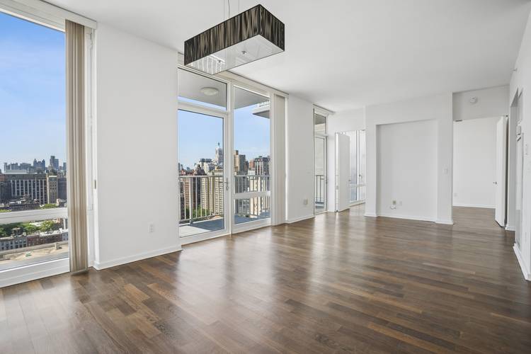 Newly renovated floors throughout the Penthouse apartment has two bedroom two bathroom at the Gramercy by Starck Condominium.