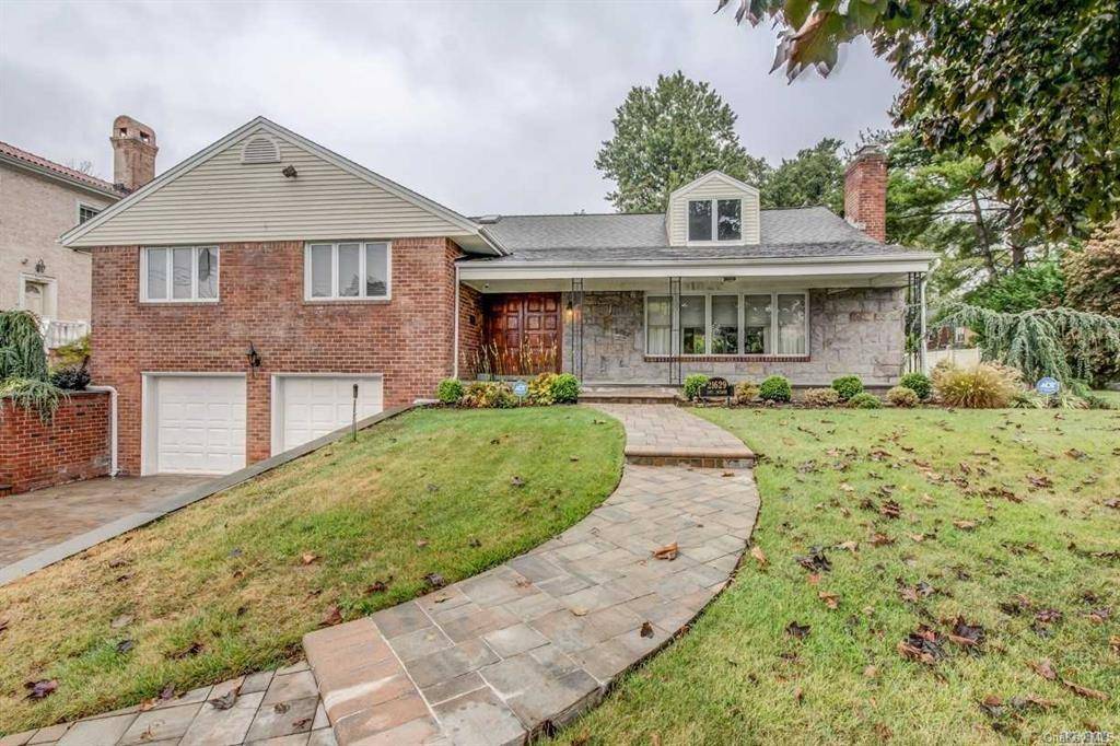 Exquisite Split Level Residence in Prestigious Bayside Gables.