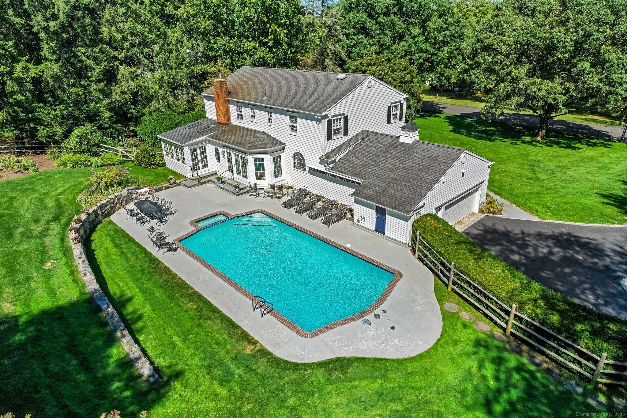 Nestled in one of North Stamford's most coveted cul de sac neighborhoods, come fall in love with this stunning, professionally landscaped meticulously maintained home.