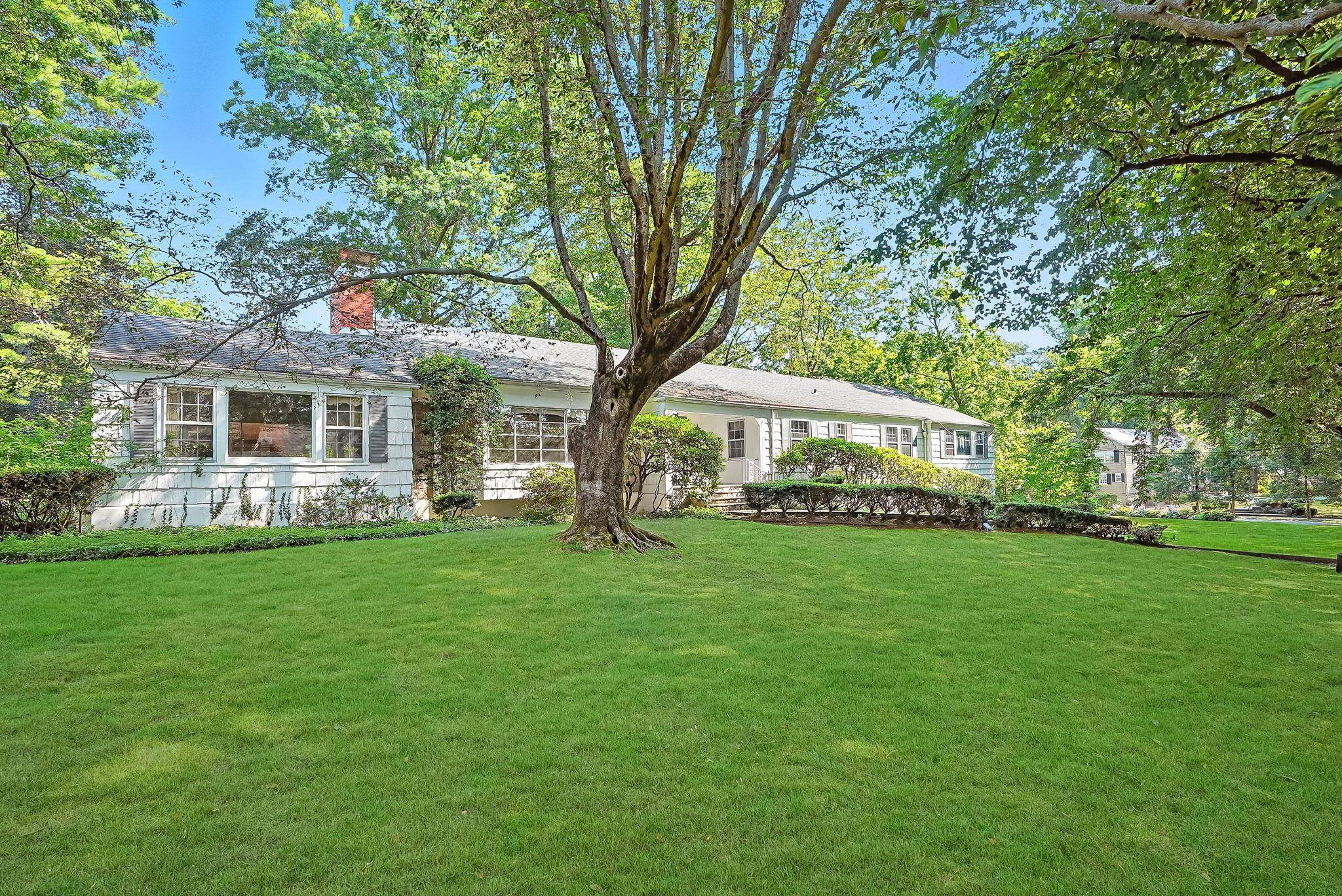 Sprawling six bedroom, four bathroom Ranch on.