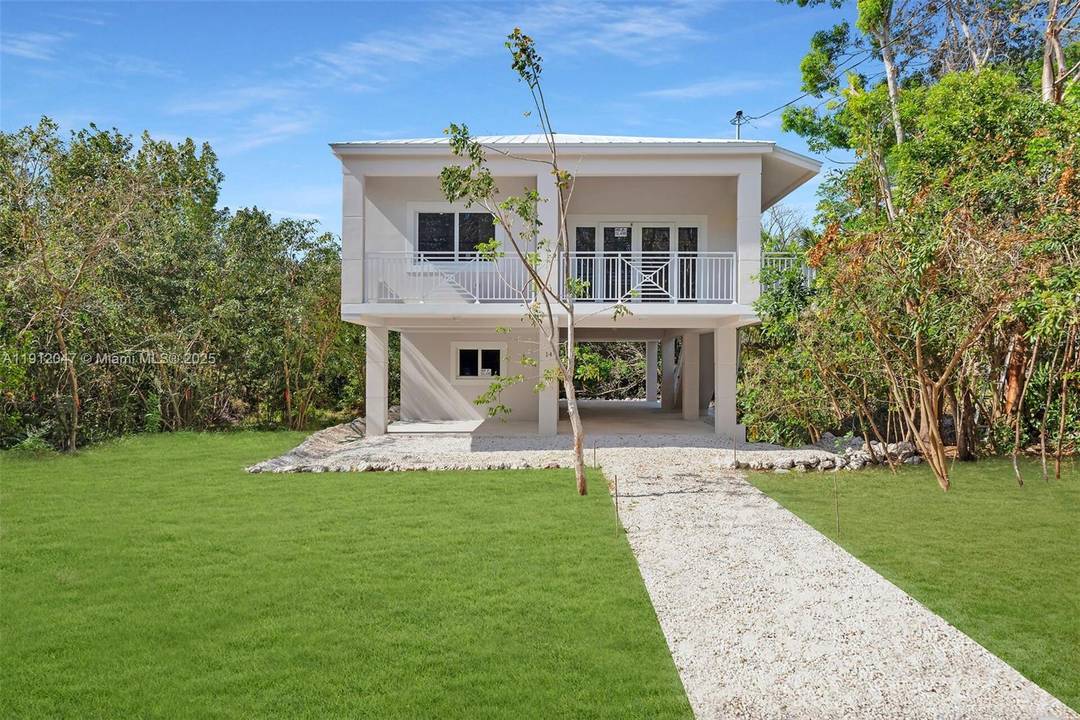 MAJOR PRICE REDUCTION ON THIS BRAND NEW CBS 3 2 HOME IN RIVIERA VILLAGE KEY LARGO !