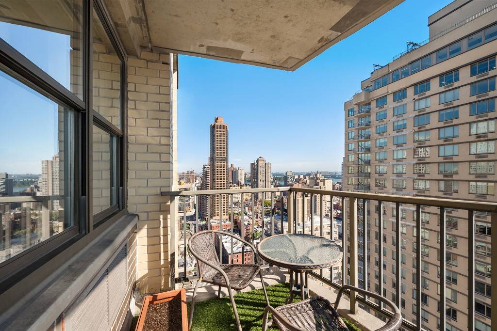 Experience the epitome of high rise living in this stunning 2 bedroom corner unit at the East Winds Condominium.