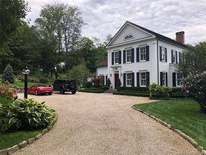 LUXURIOUS SUMMER SHARON RENTAL WITH POOL This extraordinary custom built home is professionally decorated and has nine foot ceilings throughout.
