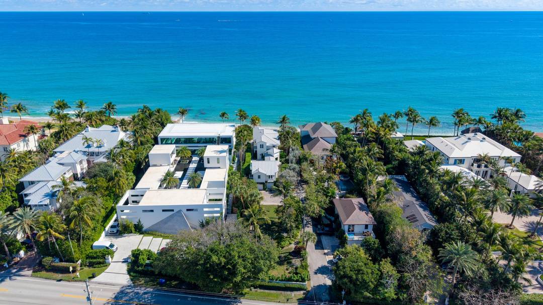 Experience the ultimate in beachfront living at 6201 N Ocean Blvd, a hidden tropical sanctuary in the exclusive town of Ocean Ridge.