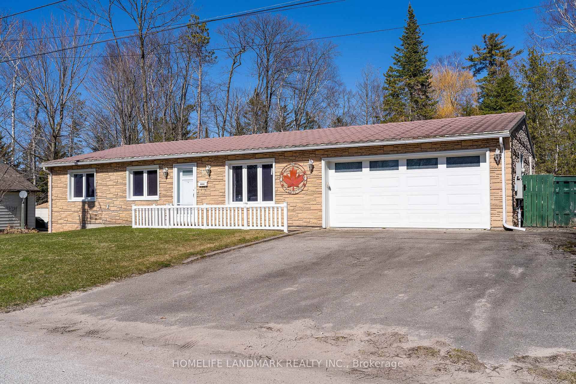 Welcome to this beautifully built 3 bedroom, 2 bathroom bungalow located just a hundred meters walk from the sandy shores of Georgian Bay !