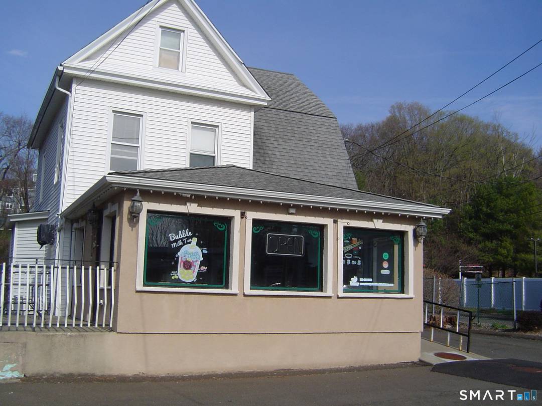 High Visibility Commercial Investment Opportunity Whitney Avenue Positioned in a heavily traveled corridor, this well maintained mixed use property offers strong, reliable income with upside potential.