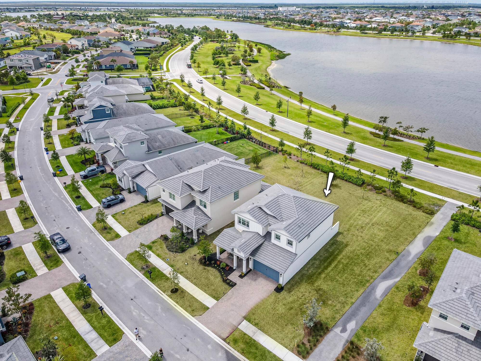 Enjoy breathtaking, unobstructed lake views and incredible sunsets from this bright and inviting 4BR 3BA home in the heart of Arden.
