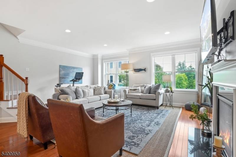 Beautiful townhome located in highly desirable Mountain Lakes, offering top rated schools, convenient access to shopping, the Mountain Lakes Train Station, and major highways.