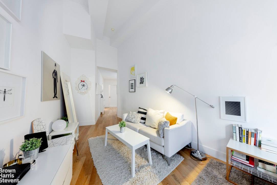 FOR INVESTORS ONLY ULTRA HIGH 13' CEILINGS AND MASSIVE WINDOWS are the hallmarks of this sun flooded, oversized Alcove Studio Sleeping, Dining, or Home Office Alcove at 99 John Deco ...