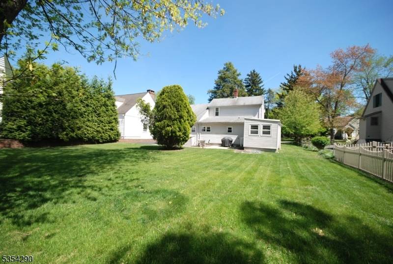 Well maintained custom home offering incredible flexibility with dual staircases and separate living spaces.