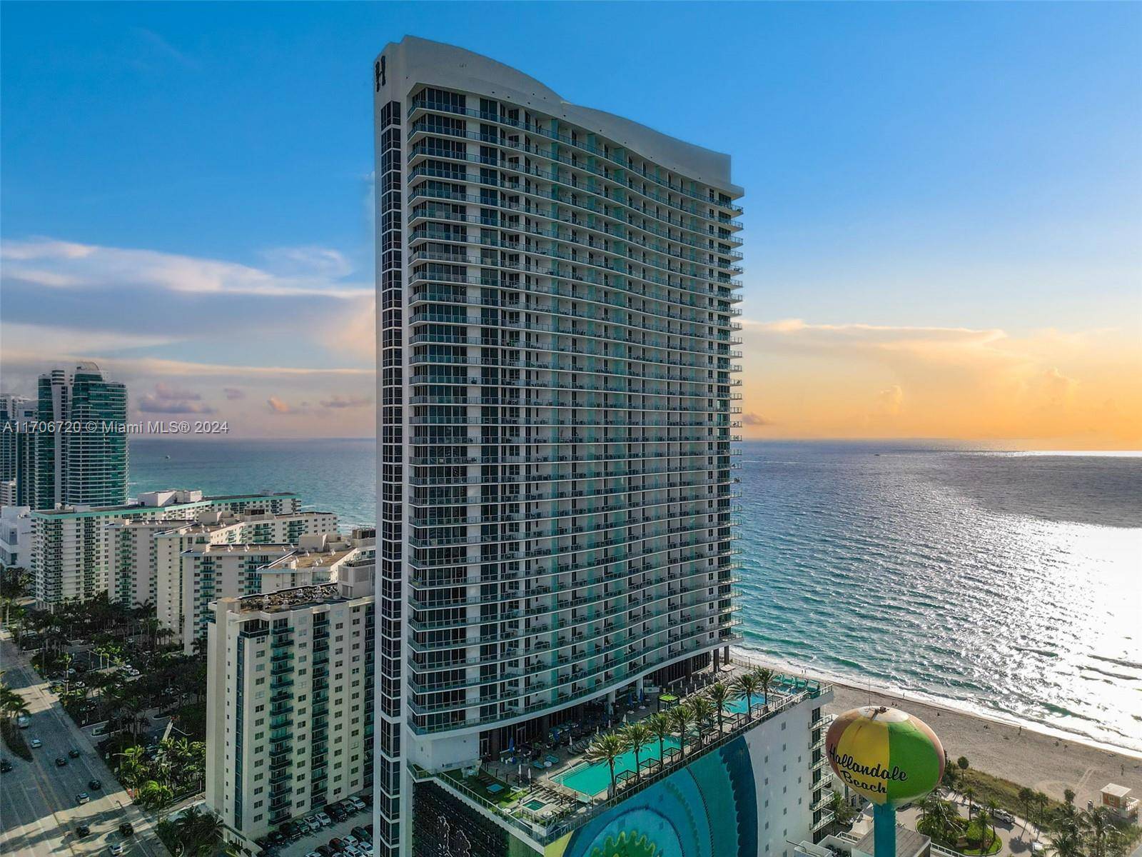 Don t miss this rare opportunity to own a corner unit with breathtaking ocean views and a massive wrap around balcony offering direct beach access.