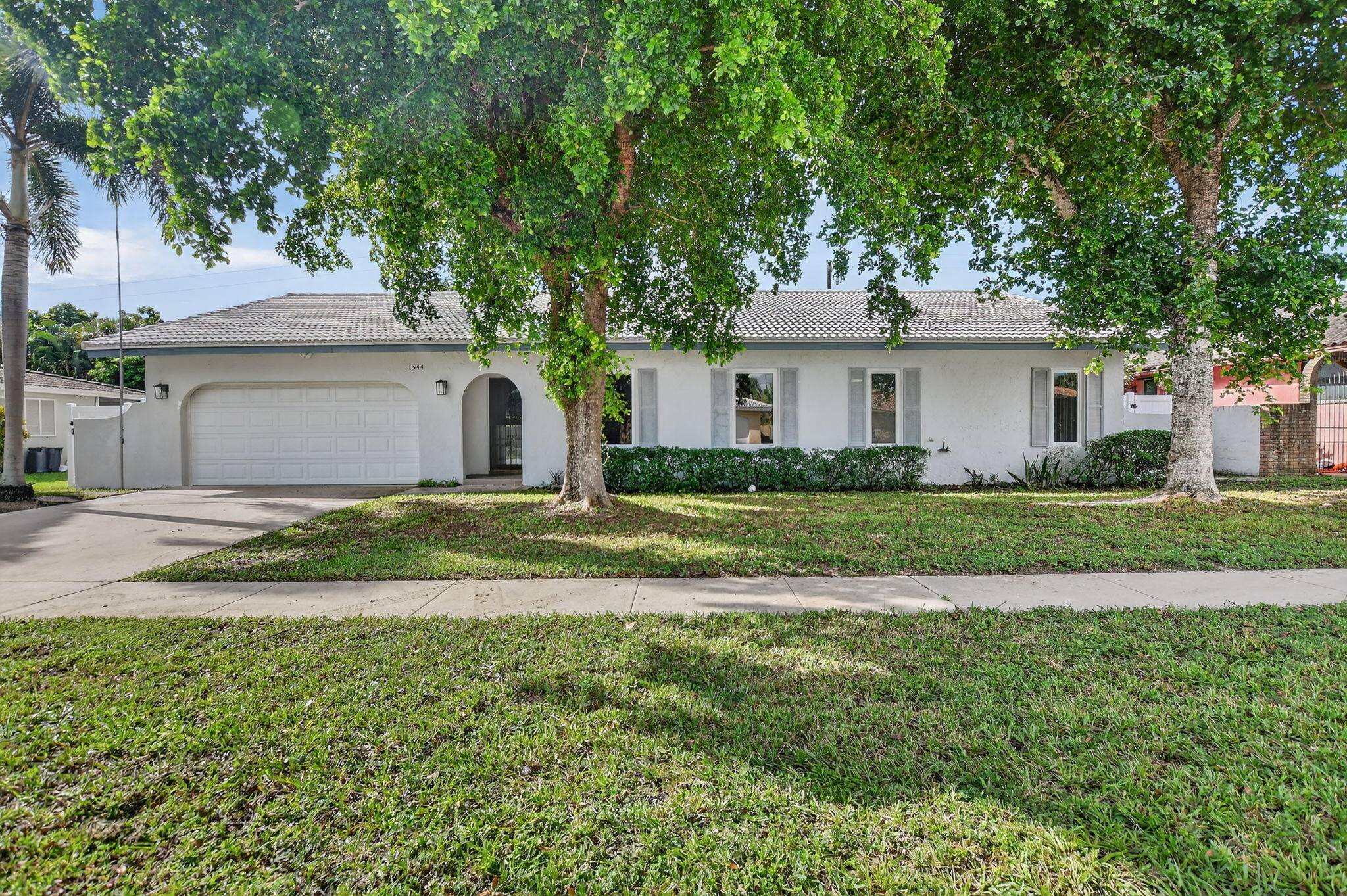 Welcome to 1544 NW 9th Street, a charming single family home perfectly situated in the heart of Boca Raton.
