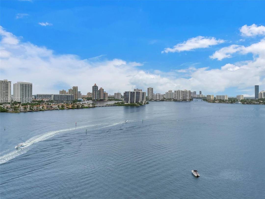 Stunning fully renovated corner unit with breathtaking panoramic Intracoastal and ocean views from the high floor wraparound balcony and every window.