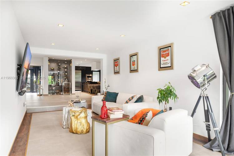 MOVE IN READY ! Stunning fully furnished, renovated home features 5 spacious beds, 4.