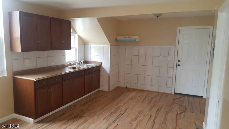 Investor Opportunity 2 family Home, Newark Income producing 2 family property offering strong upside for investors or Owner occupants seeking rental potential.