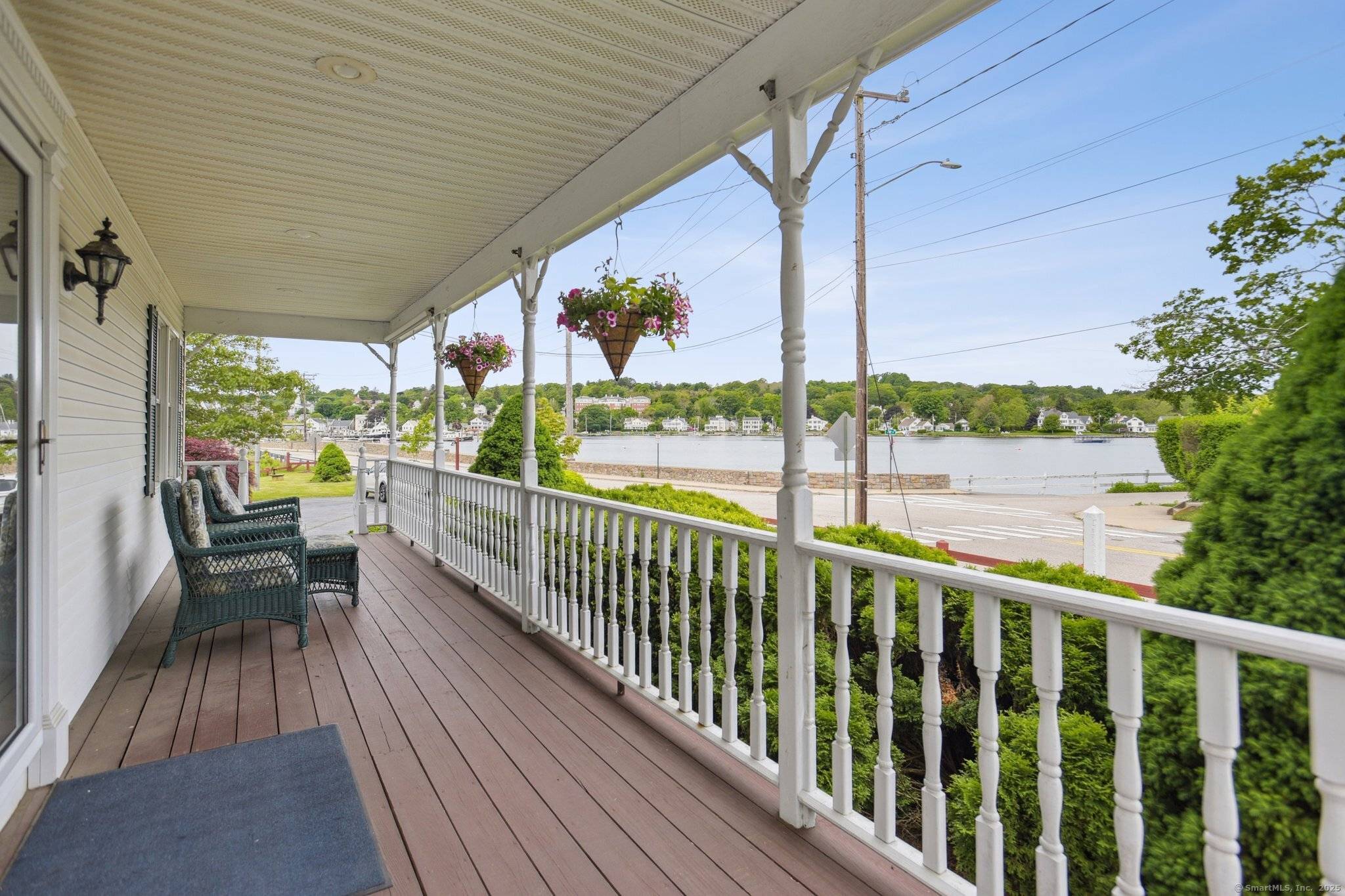 Welcome to your dream home nestled in the heart of downtown Mystic's historic district.