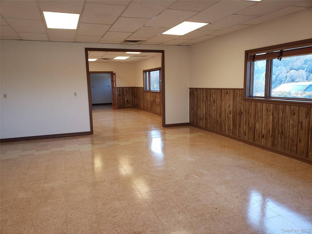 1, 350 sq ft Office space with potential for additional warehouse space and outdoor parking storage.