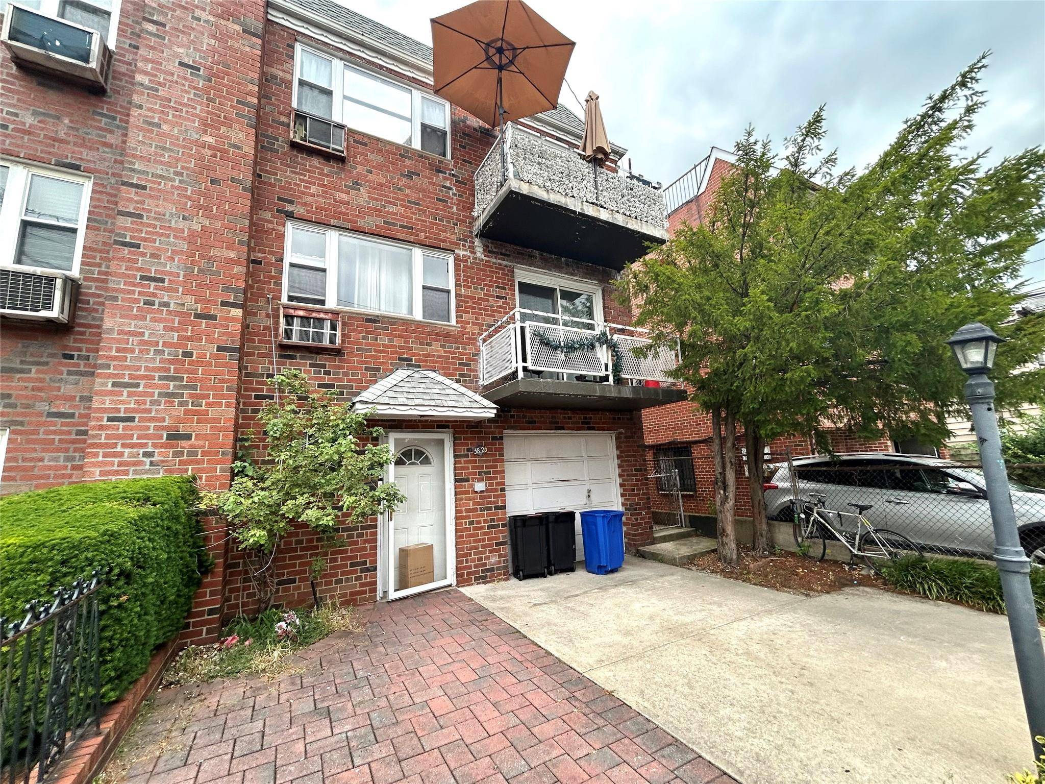 Welcome to this extra large All Brick 6 6 3 Semi Attached TWO Family building 3 floors all above ground located in central Middle Village, Queens.