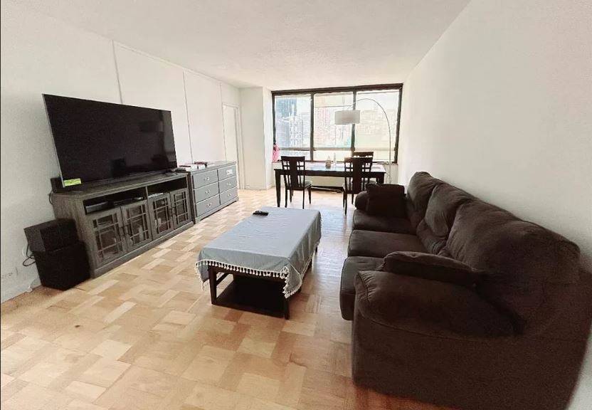 Spacious corner 2 bedroom, 2 marble baths condo with high ceilings, large windows, city river views, beautiful windowed kitchen with breakfast counter and fantastic panoramic Western Manhattan views !