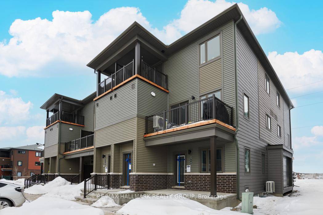 Be the first to live in this beautifully designed Brand New, Ground Level 3 Bedroom, 2 Bathroom Stacked Townhome.