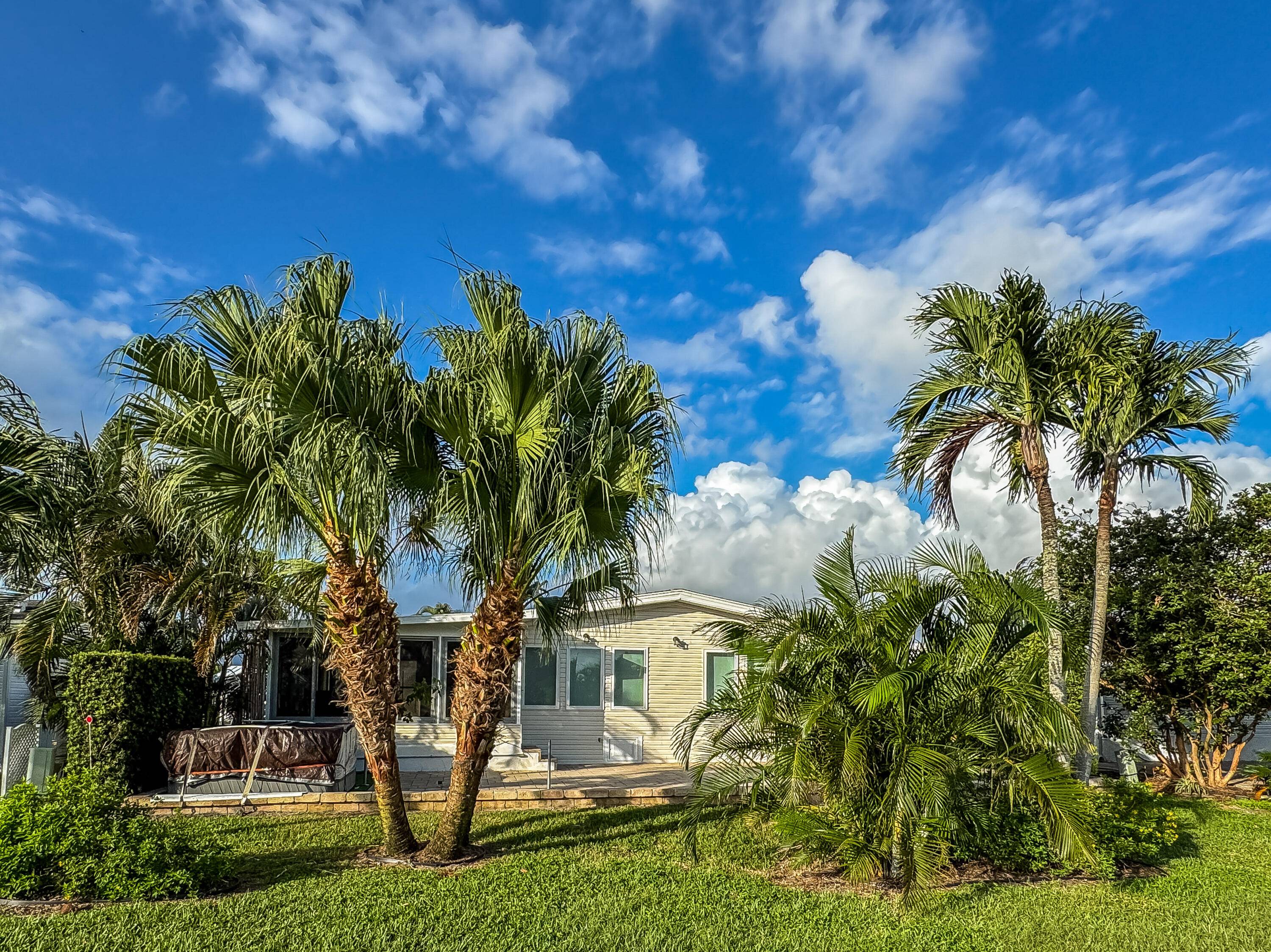 Welcome to your beautifully remodeled oasis in the heart of Boynton Beach at the desirable community of La Paloma !