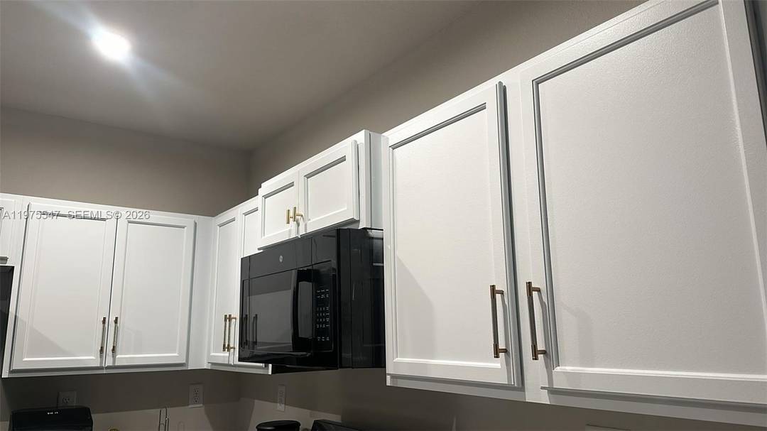 Newly built property, new glass shower enclosures in bathrooms, 3 full bathrooms and 3 bedrooms, large enclosed patio.