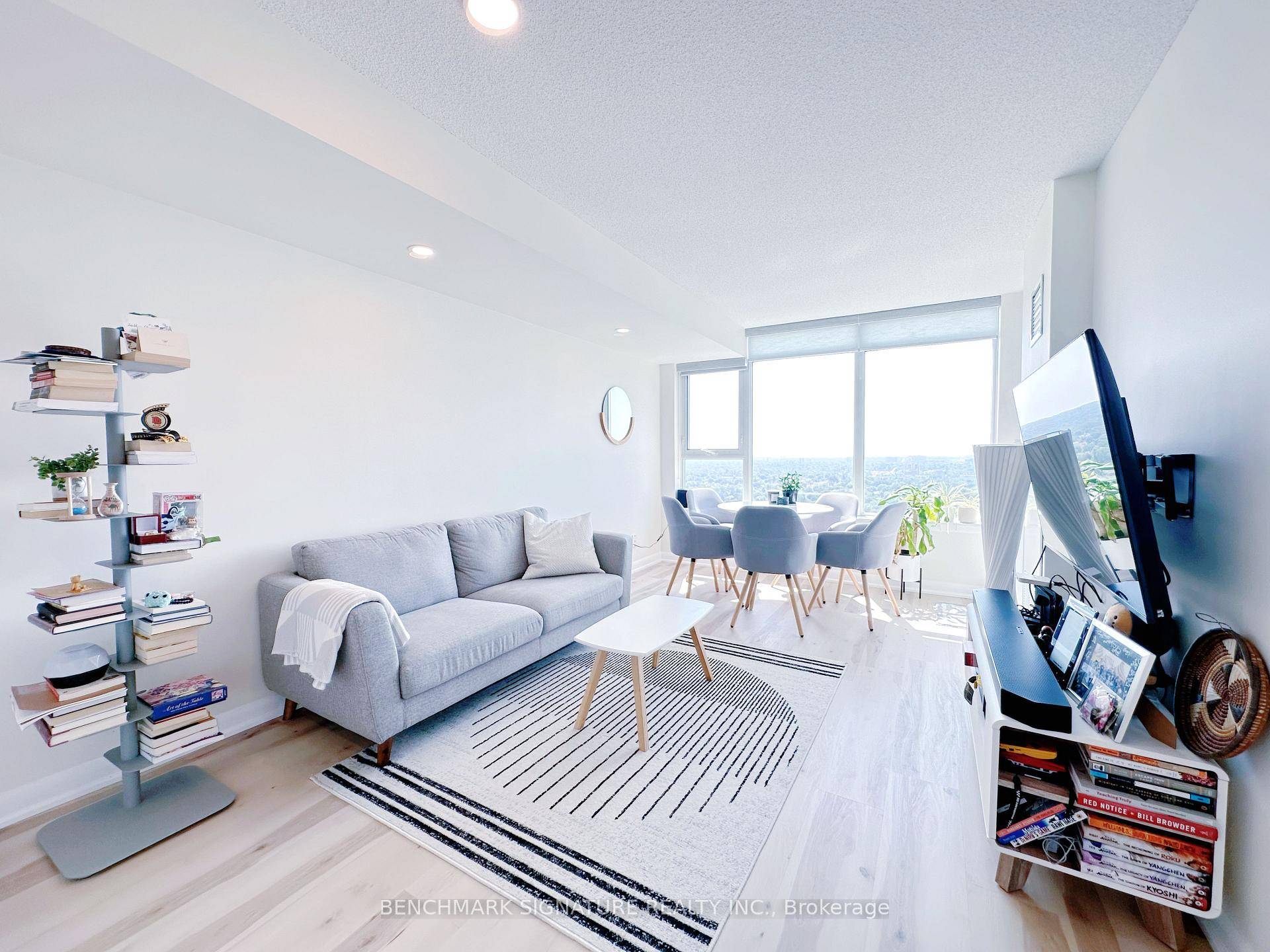 Welcome to this bright, sun filled, and spacious 1 Bedroom Large Den condo in an unbeatable location.