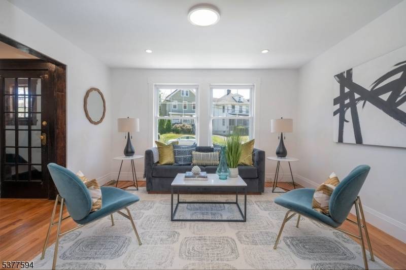 FABULOUS updated 4BR 2BA second third floor unit.